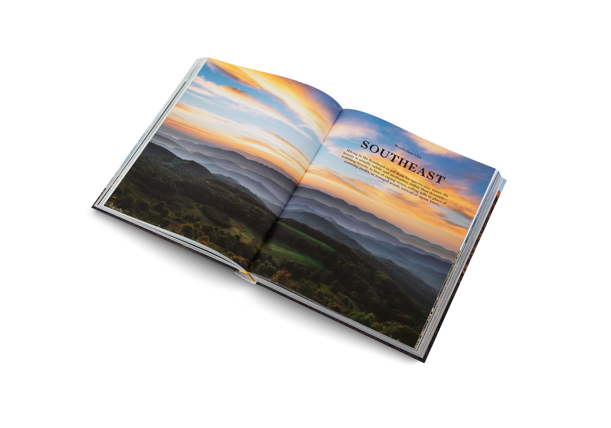 Open book titled Wanderlust USA by gestalten & teNeues with colorful landscape photographs on pages.