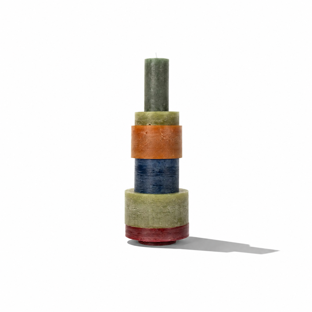 Stack of Candl Stack 06 candles by Stan Editions, showing multiple cream-colored candles with textured surfaces.