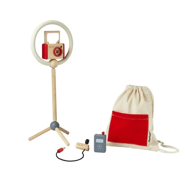 PlanToys Vlogger Play Kit includes toy camera, microphone, and accessories for imaginative role-playing as a vlogger.