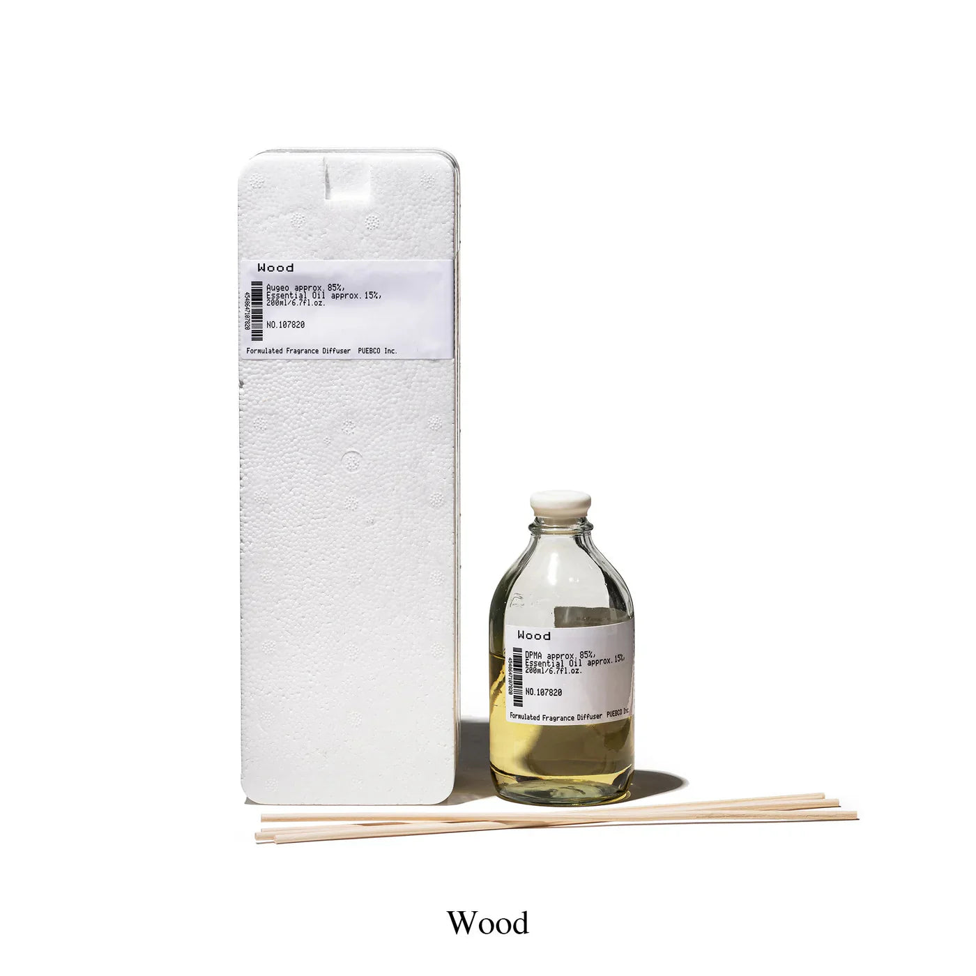Puebco formulated fragrance diffuser with sleek glass bottle and reed sticks for home scent diffusion.