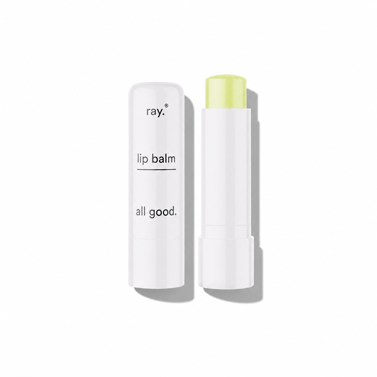 Ray lip balm in a sleek tube, showing a smooth, natural finish with the cap removed, ready for moisturizing application.