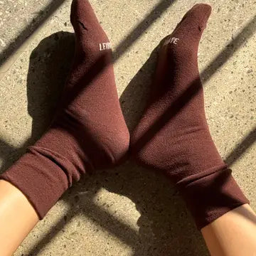 Le Bon Shoppe Breezy Sneaker Socks in soft fabric, shown laid flat with ribbed cuffs and a comfortable fit design.