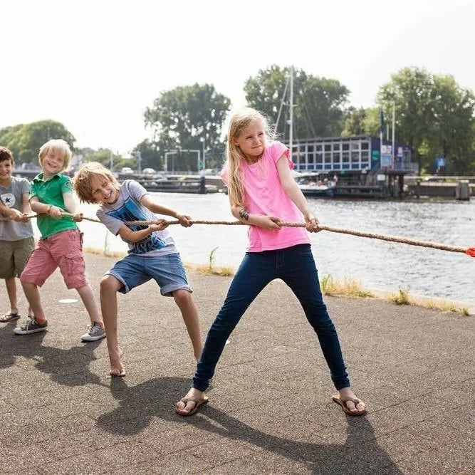 Colorful tug of war rope toy by BS Toys, suitable for children and outdoor play, featuring bright, durable design.