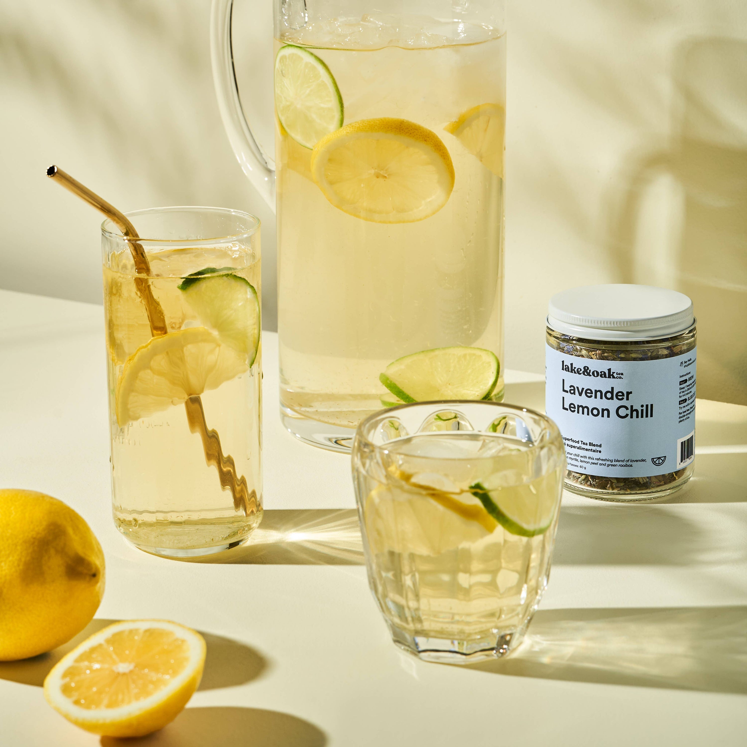 Lavender Lemon Chill tea by Lake & Oak Tea Co. in a clear glass cup, showcasing a brewed herbal tea with lavender and lemon slices.