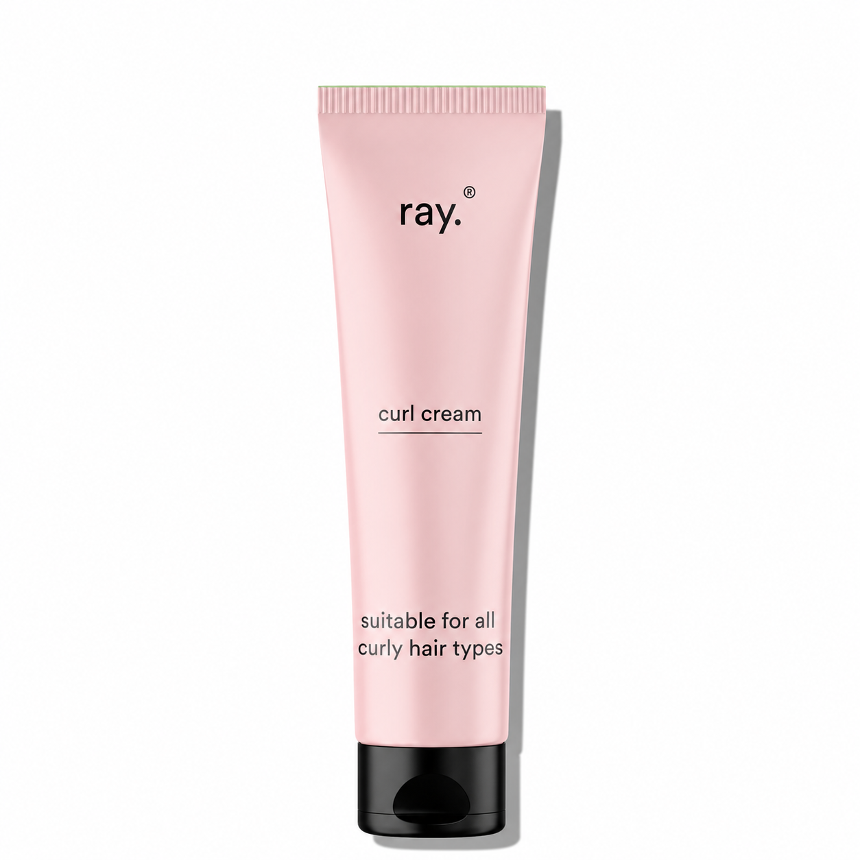 Ray Curl Cream in a jar, showcasing its creamy texture, designed for defining and moisturizing curly hair.