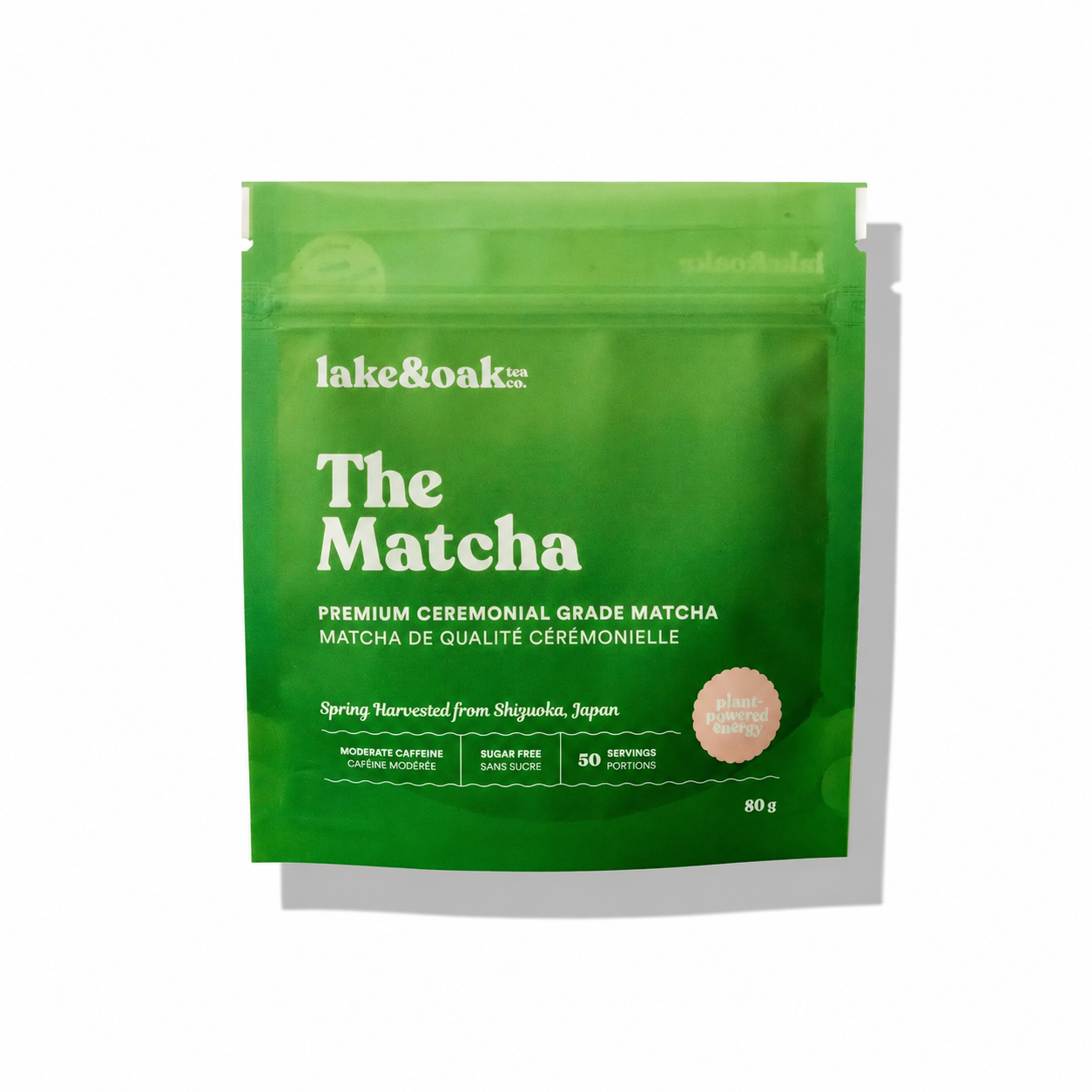 A package of Lake & Oak Tea Co. The Matcha, vibrant green powdered tea in a white box with green accents, ready for preparation.