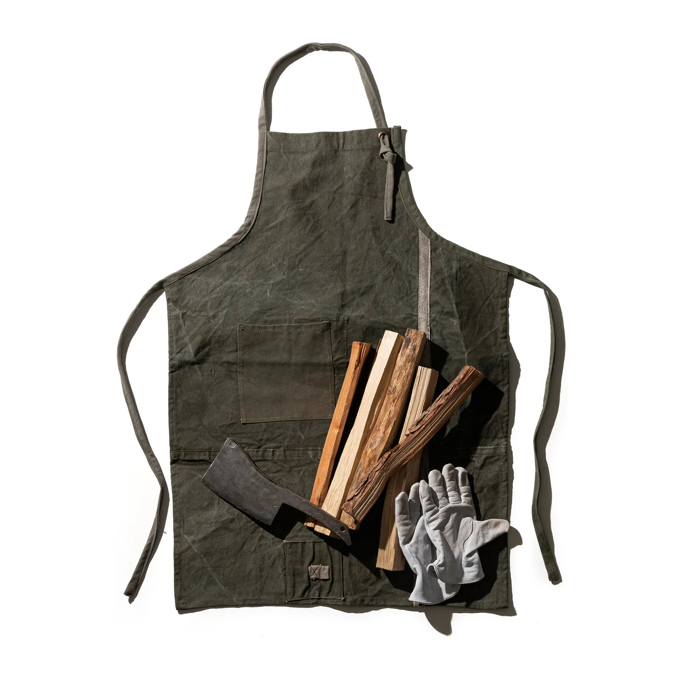 Vintage Tent Fabric Apron by Puebco with durable, rustic tent material and adjustable straps, ideal for cooking or gardening.