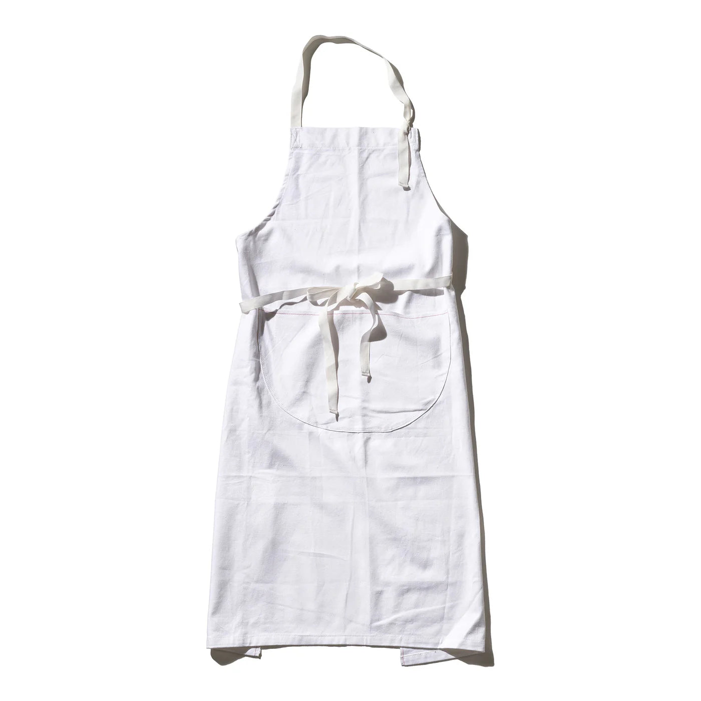 Puebco utility apron with multiple pockets, made of durable fabric, designed for practical work and everyday tasks.