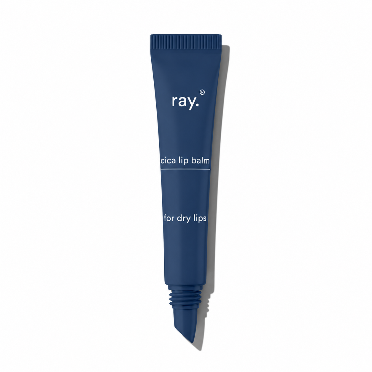 Ray Cica Lip Balm in a small tube with a white cap and green label, designed for nourishing and soothing lips.