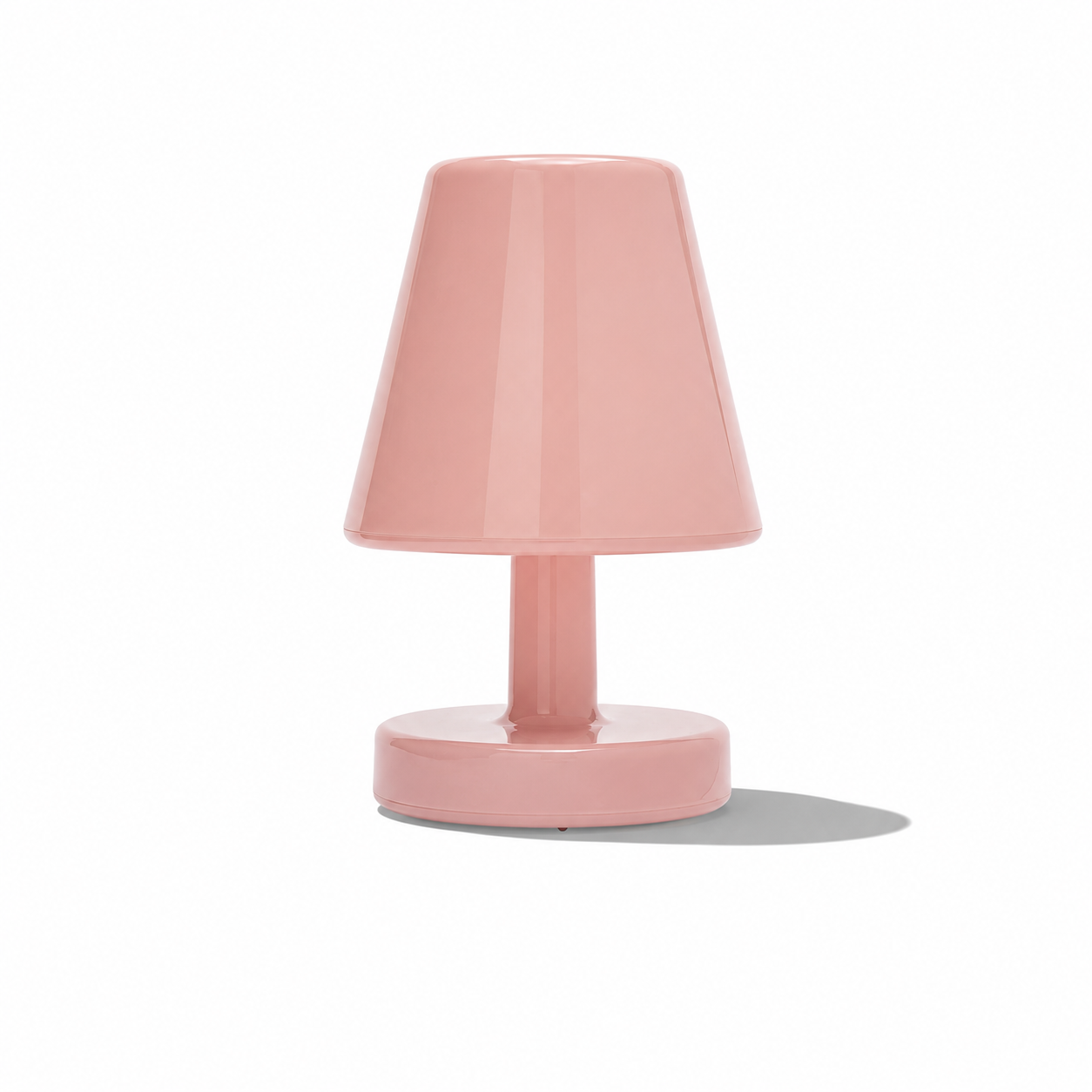 Fatboy Edison The Ambiance lighting fixture glowing with warm, ambient light, showcasing modern design and soft illumination.