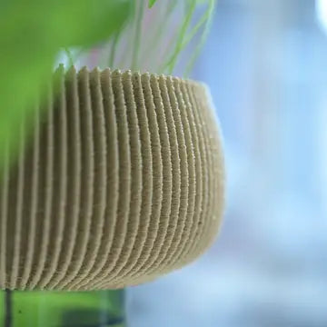 Stuart Studio Flower Pot Zini with sleek design, ceramic material, and a modern finish, perfect for indoor or outdoor plants.
