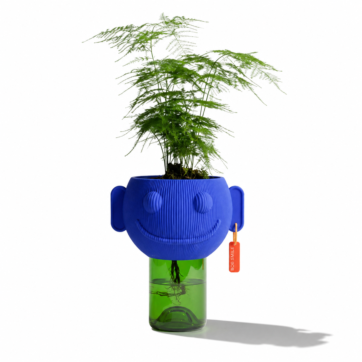 Stylish Stuart Studio Flower Pot with rounded shape and textured surface, ideal for indoor or outdoor plant display.