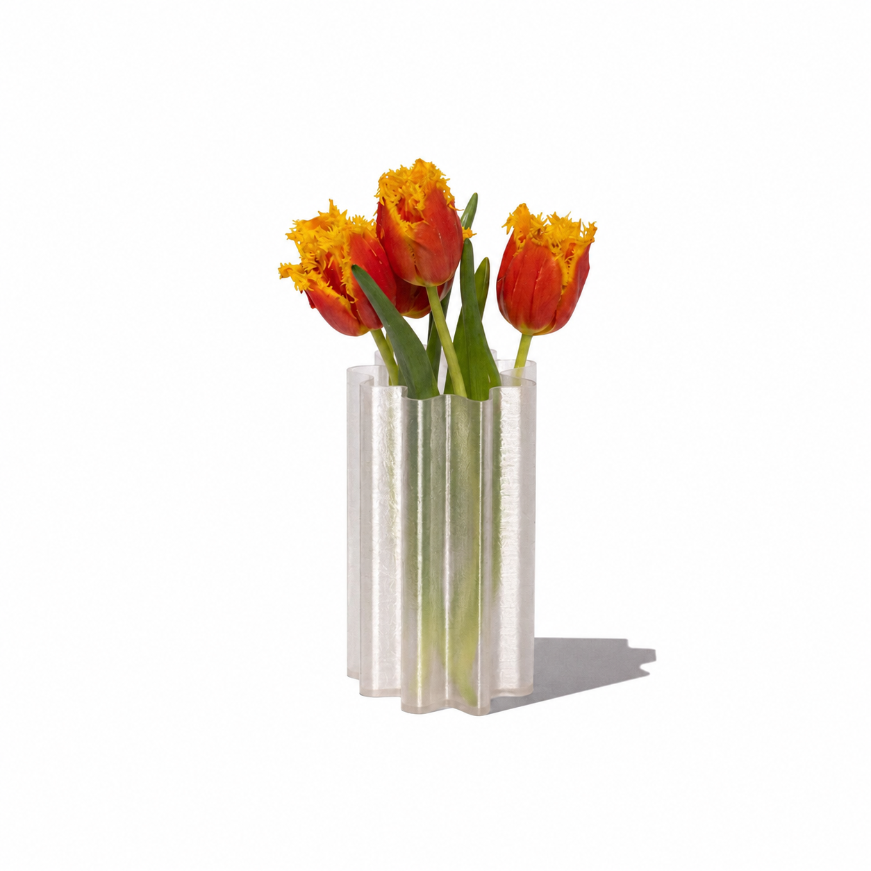 Studio Shorimoma Vala Vase, elegant ceramic vase with textured surface, showcasing a modern design and neutral color.