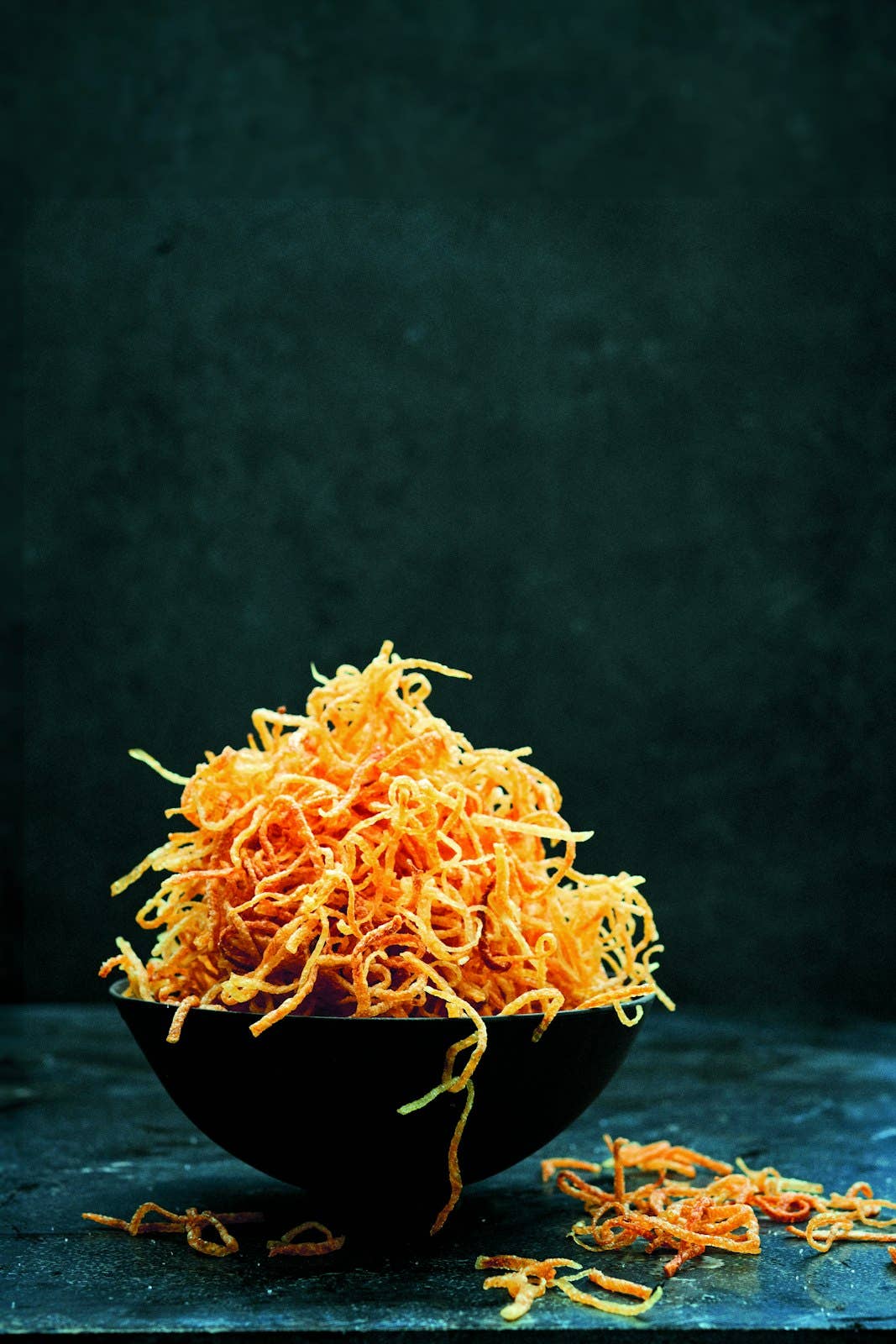 Book titled "Potato Total" by Gestalten & teNeues featuring vibrant potato-themed illustrations on the cover.