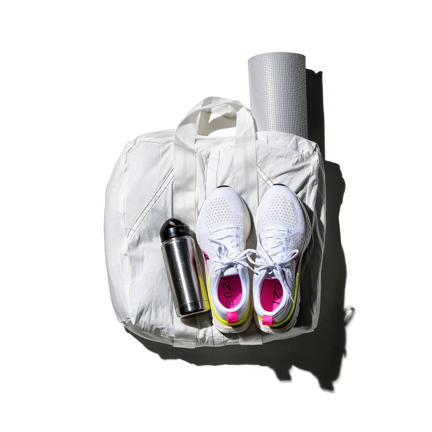Vintage Puebco parachute tote bag with durable fabric, featuring sturdy handles and a spacious interior for everyday use.