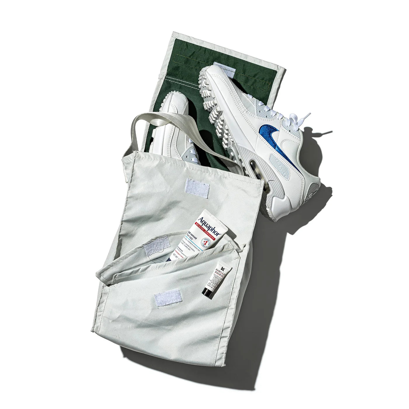 Puebco shoes bag made of durable fabric, designed to carry and protect footwear during travel or storage.