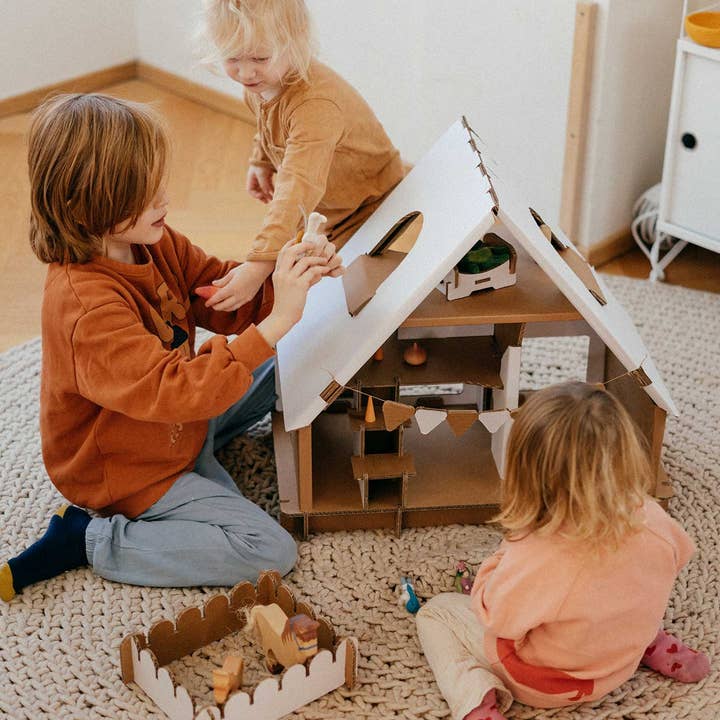 Papperlapapp Dollhouse Playie featuring miniature furniture and colorful rooms for imaginative play.
