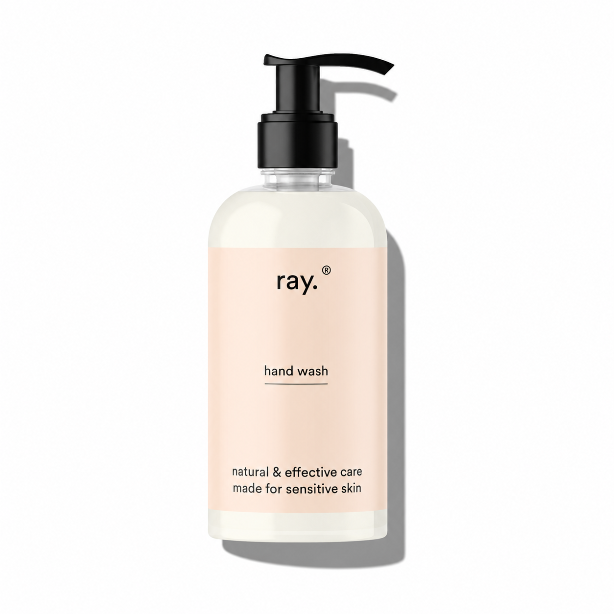 Ray Hand Wash bottle with pump dispenser, clear liquid soap in a sleek container, designed for gentle hand cleansing.