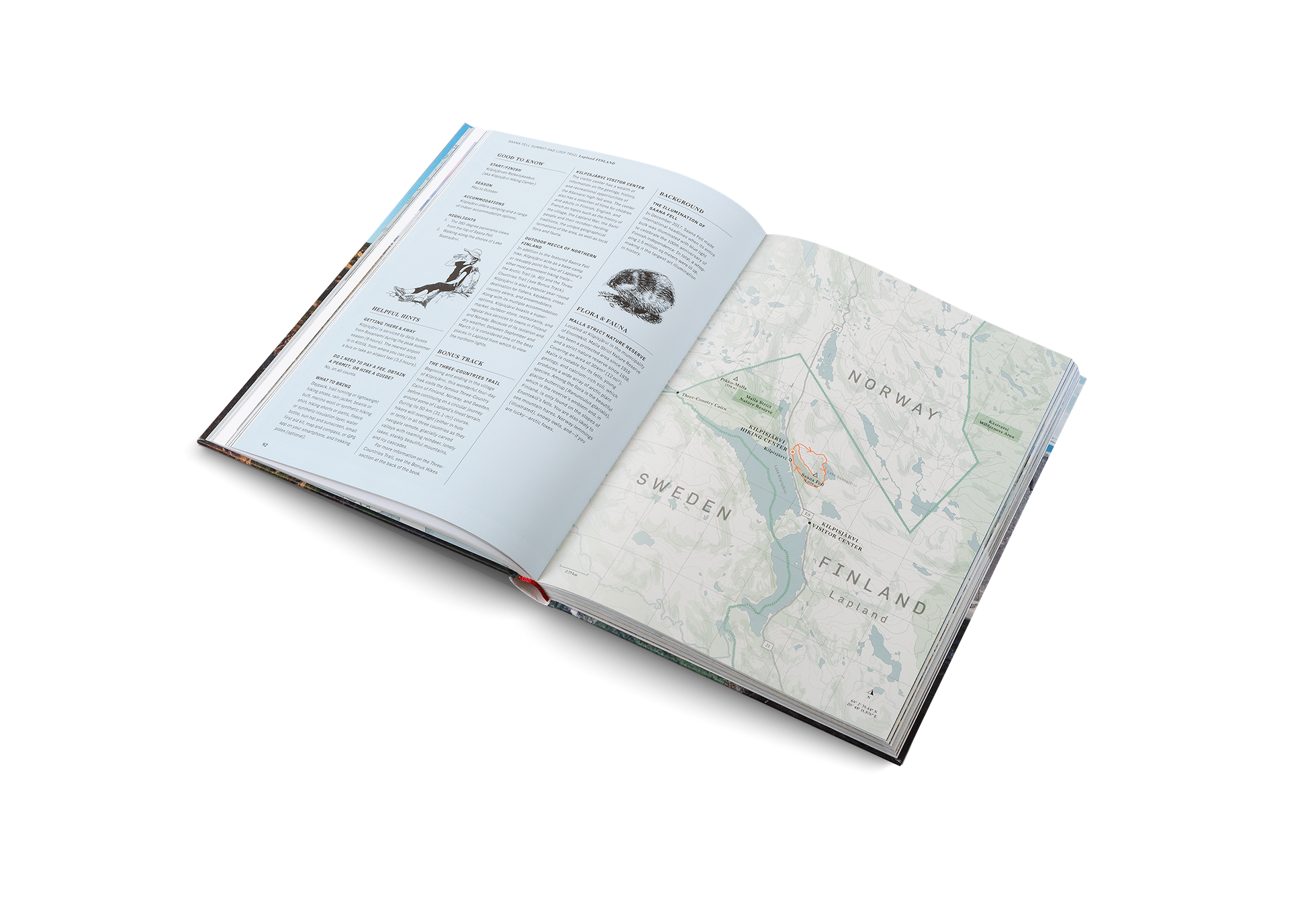 Open book titled Wanderlust Nordics by gestalten & teNeues showing scenic Nordic landscapes and travel photography pages.