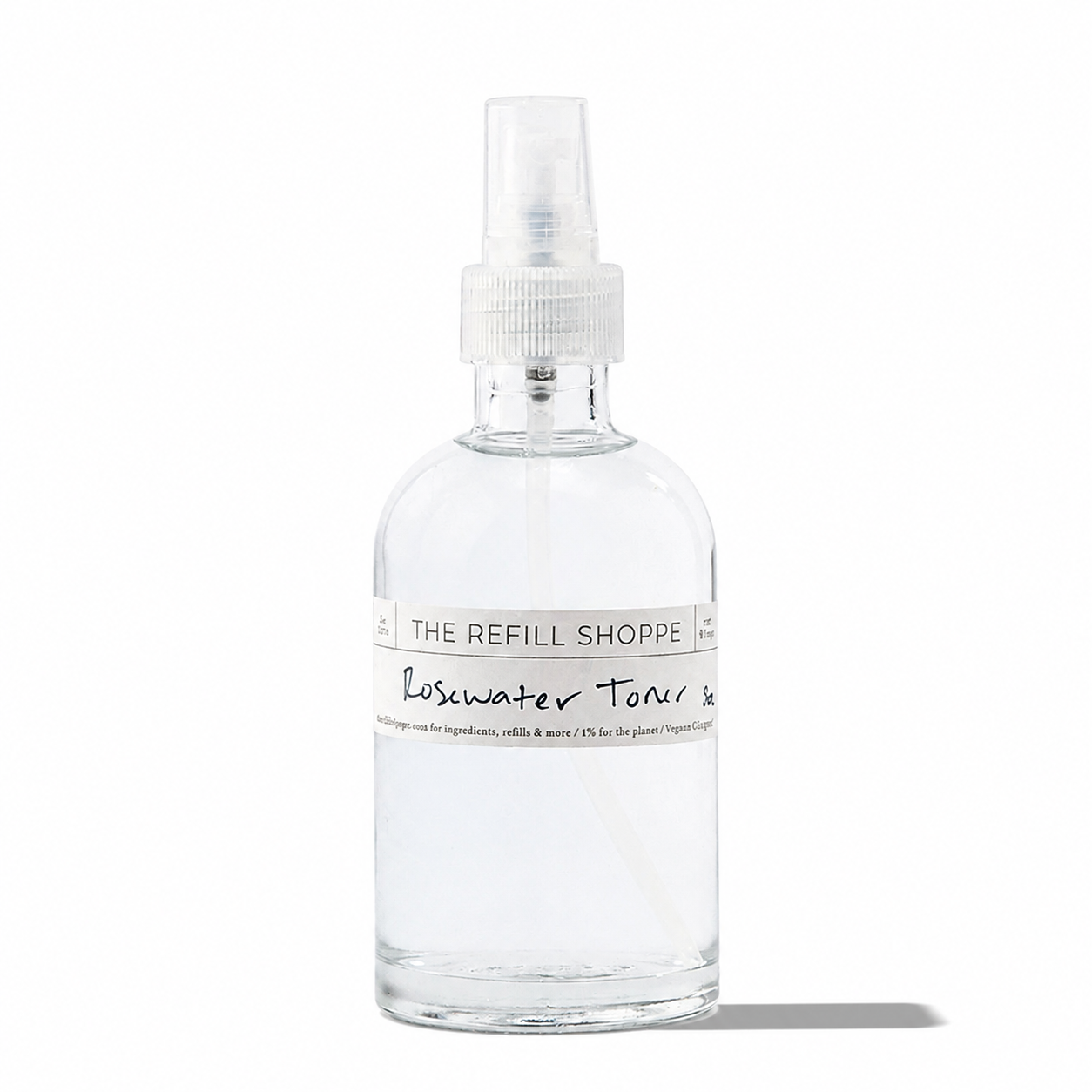The Refill Shoppe rosewater toner in a clear spray bottle, showcasing a natural skincare product for refreshing and hydrating skin.