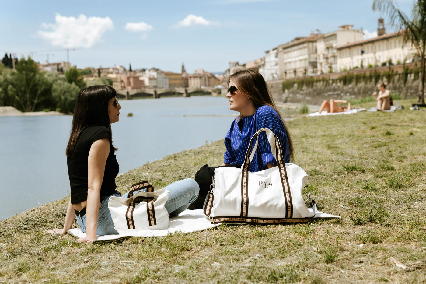 Puebco barrel bag made of durable fabric with leather handles and a spacious interior, perfect for casual or travel use.