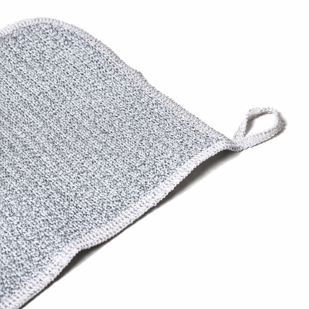 Charcoal face scrub towel by Morihata International Ltd. Co. showing textured black towel for facial cleansing.