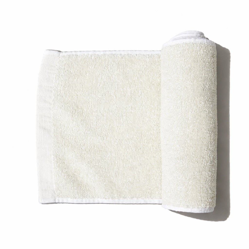 Morihata International Ltd. Co. body scrub towel with textured surface for exfoliating skin during shower or bath.