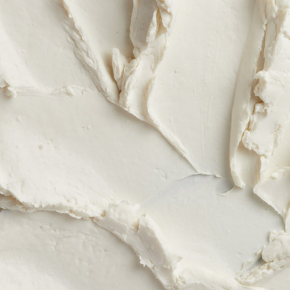 Creamy rose face butter from The Refill Shoppe, skincare product in a smooth jar with rose accents and natural ingredients visible.