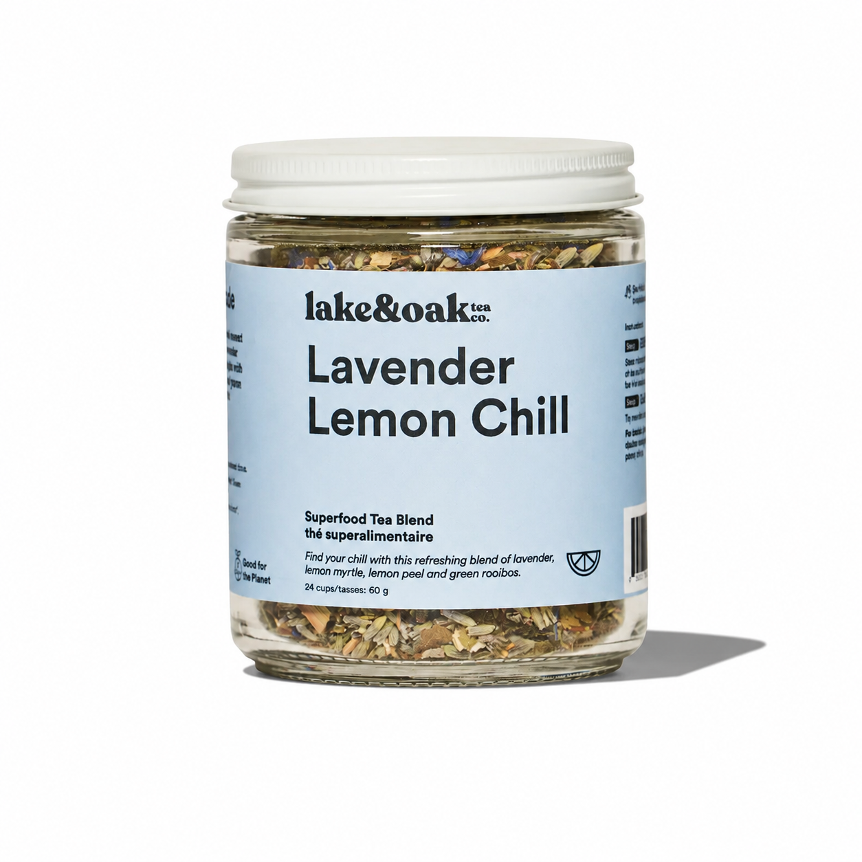 Lavender Lemon Chill tea by Lake & Oak Tea Co. in a clear glass cup with brewed tea, fresh lavender and lemon slices for aroma