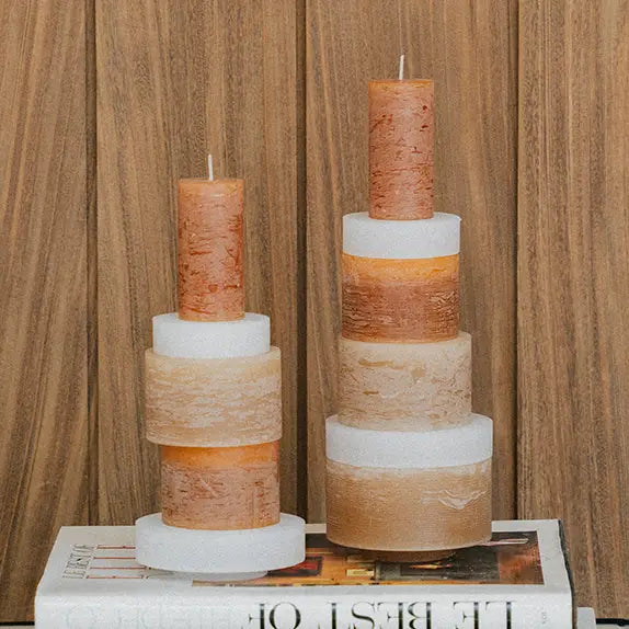 Stack of three black Candl Stack 06 candles by Stan Editions, arranged neatly on a white surface.
