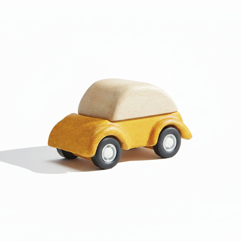 PlanToys Car Play toy featuring a colorful wooden car and road scene for imaginative play and fine motor skill development.