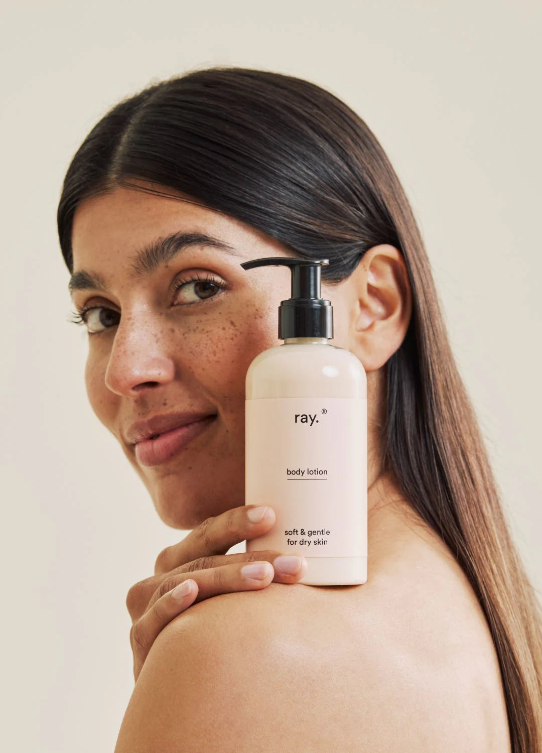 Ray Body Lotion bottle with smooth, creamy texture and fresh scent, displayed on a neutral background.