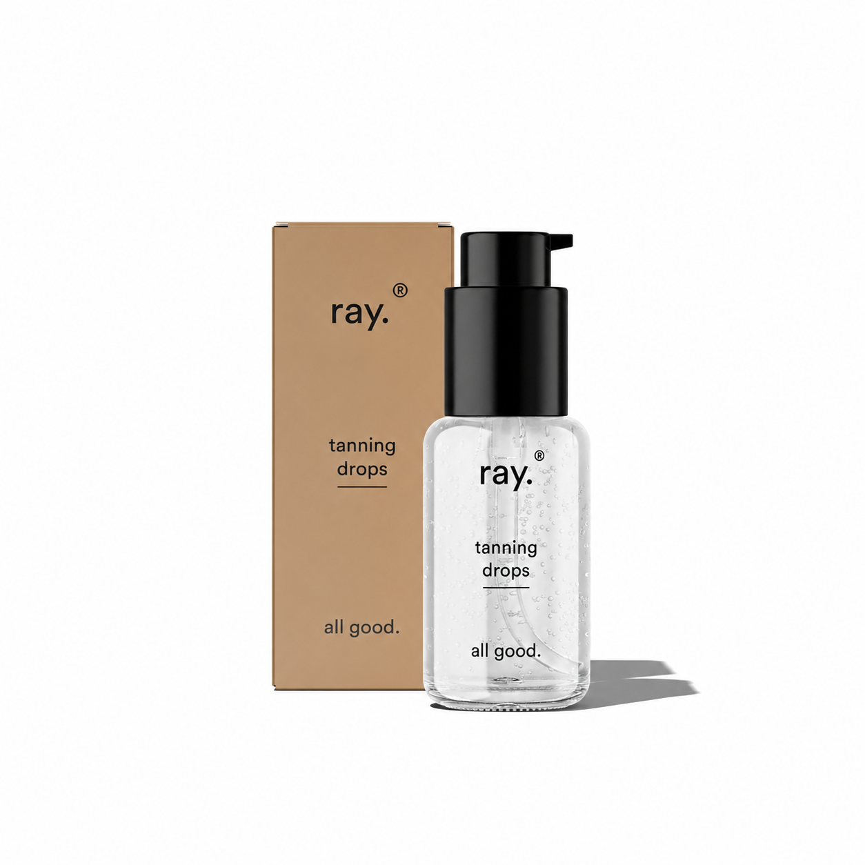 Ray Tanning Drops in a dropper bottle, showing a clear liquid formula for skin tanning and bronzing.