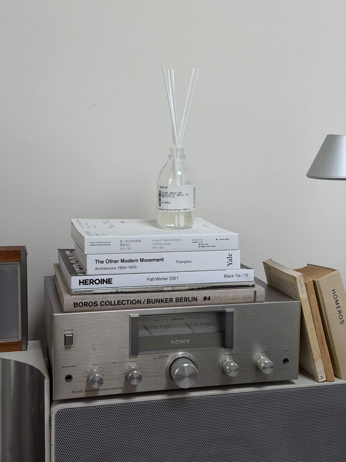 Puebco formulated fragrance diffuser with sleek glass bottle and reed sticks for home scent decor.