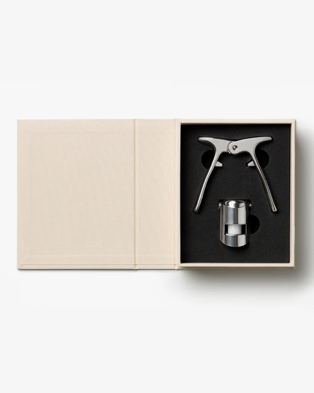 Printworks Champagne Celebrations gift set with printed champagne-themed essentials on a white background.