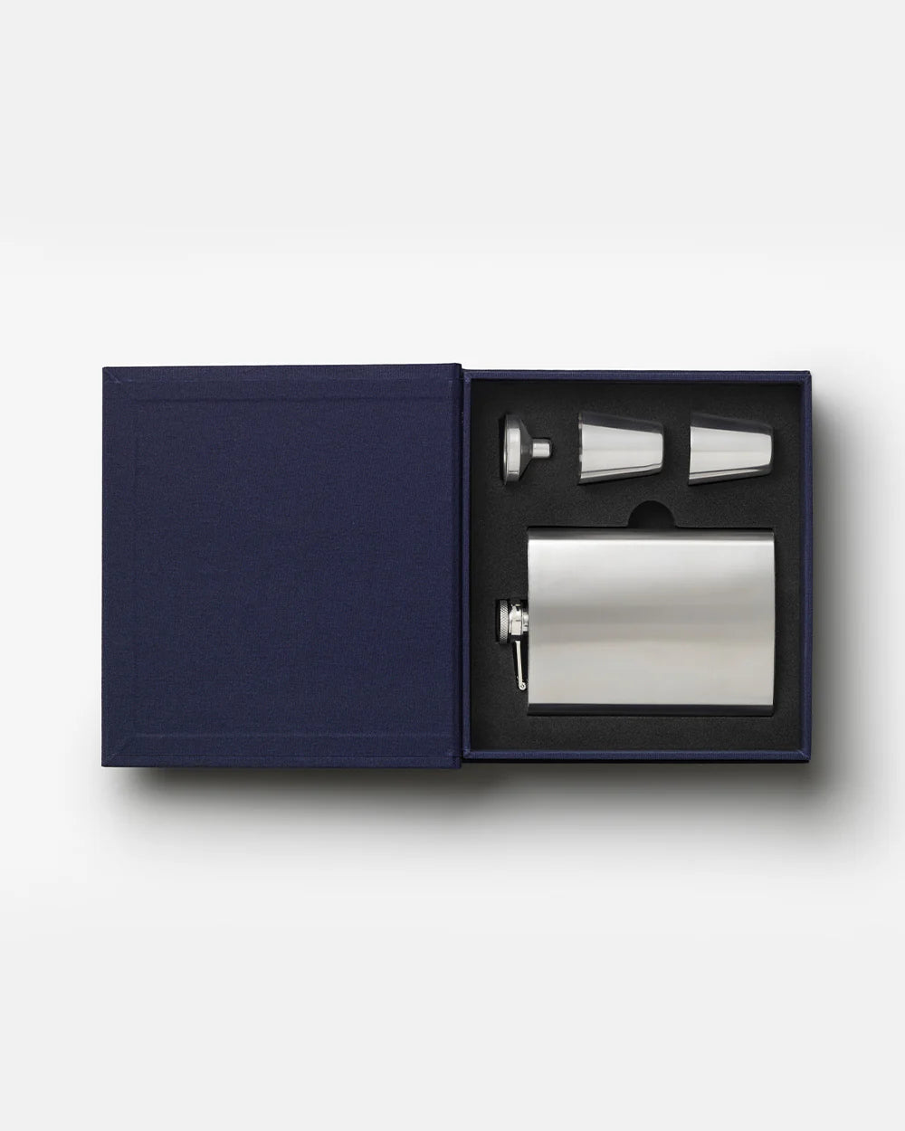 Blue Printworks hip flask gift set with accessories, including a funnel and cups, perfect for outdoor or personal use.