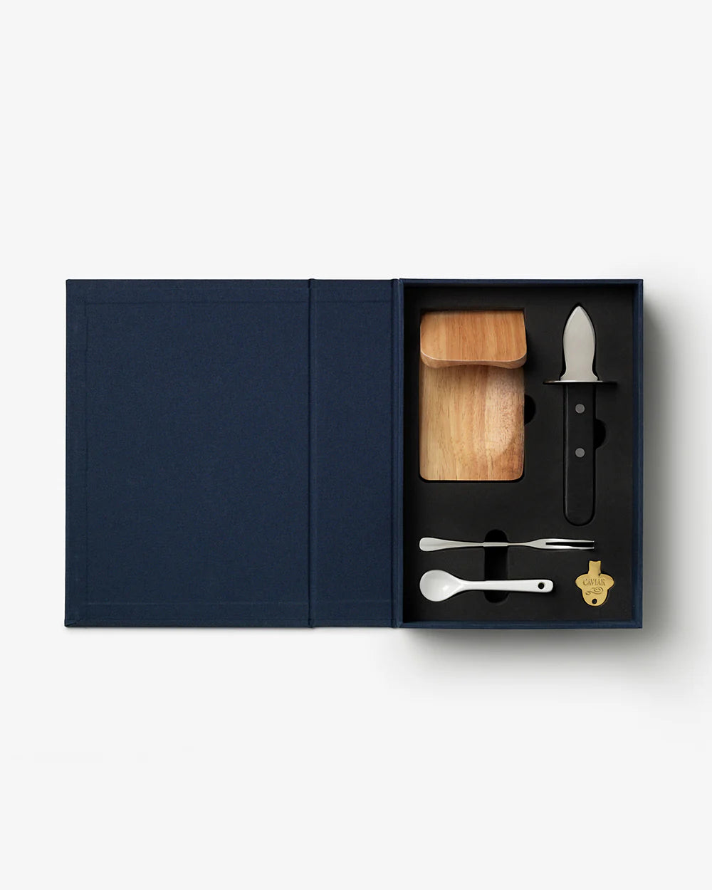 Printworks oyster and caviar tools gift set with oyster shucker, caviar spoon, and accessories on a white background