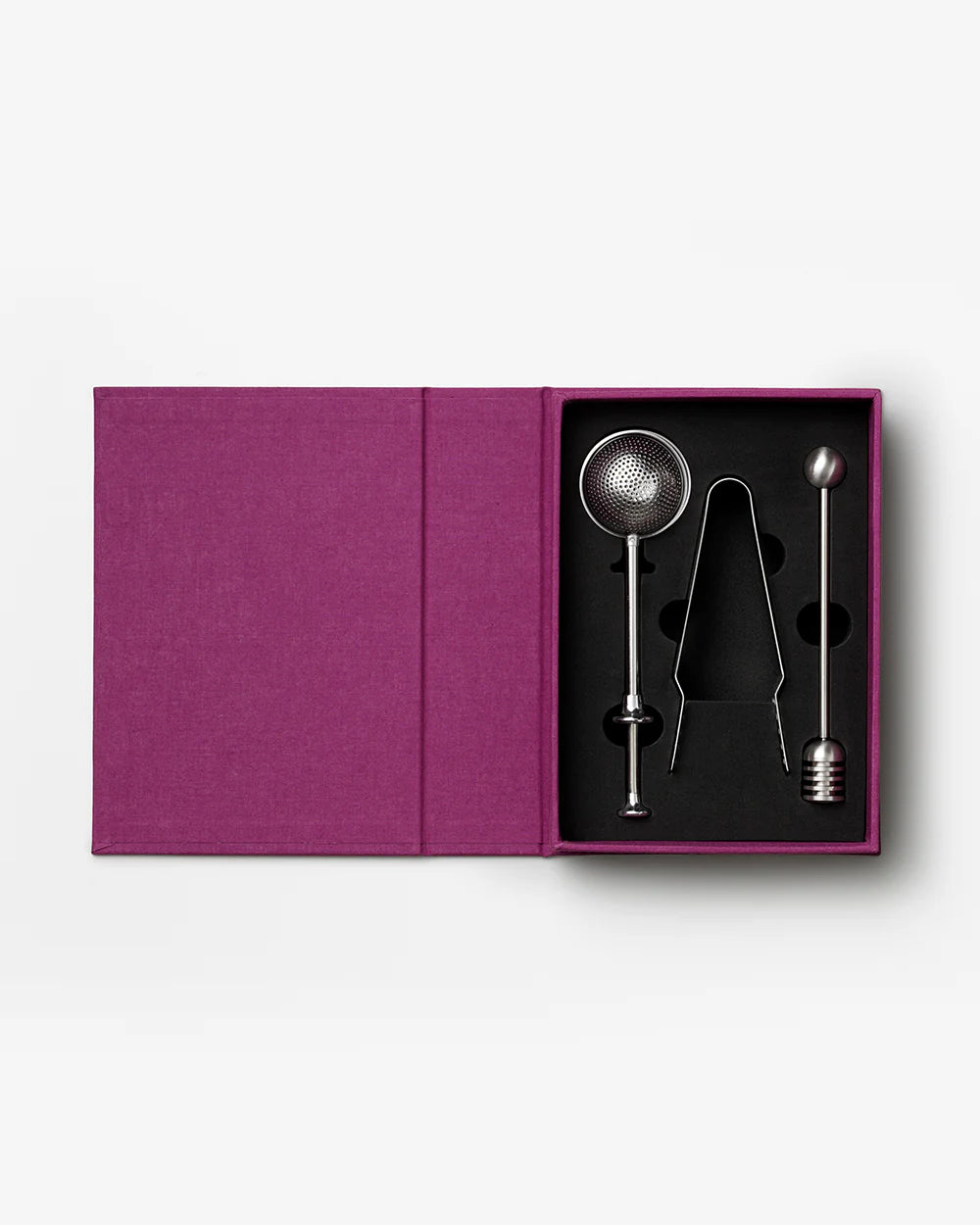 Printworks tea tools gift set including teaspoons, tea infuser, and accessories for brewing and serving tea.