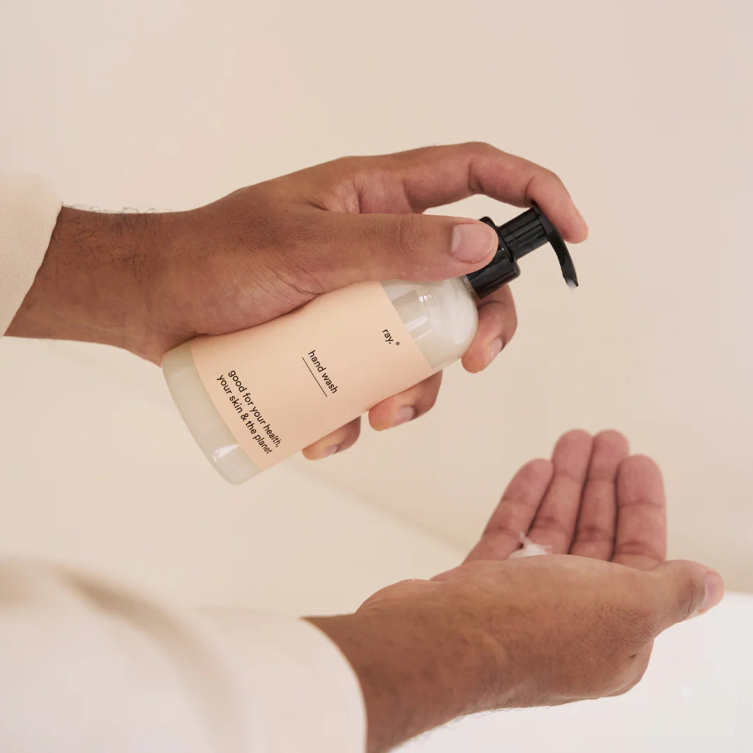 Ray hand wash bottle with label, featuring a sleek design and clear branding, ideal for personal hygiene and hand cleansing.