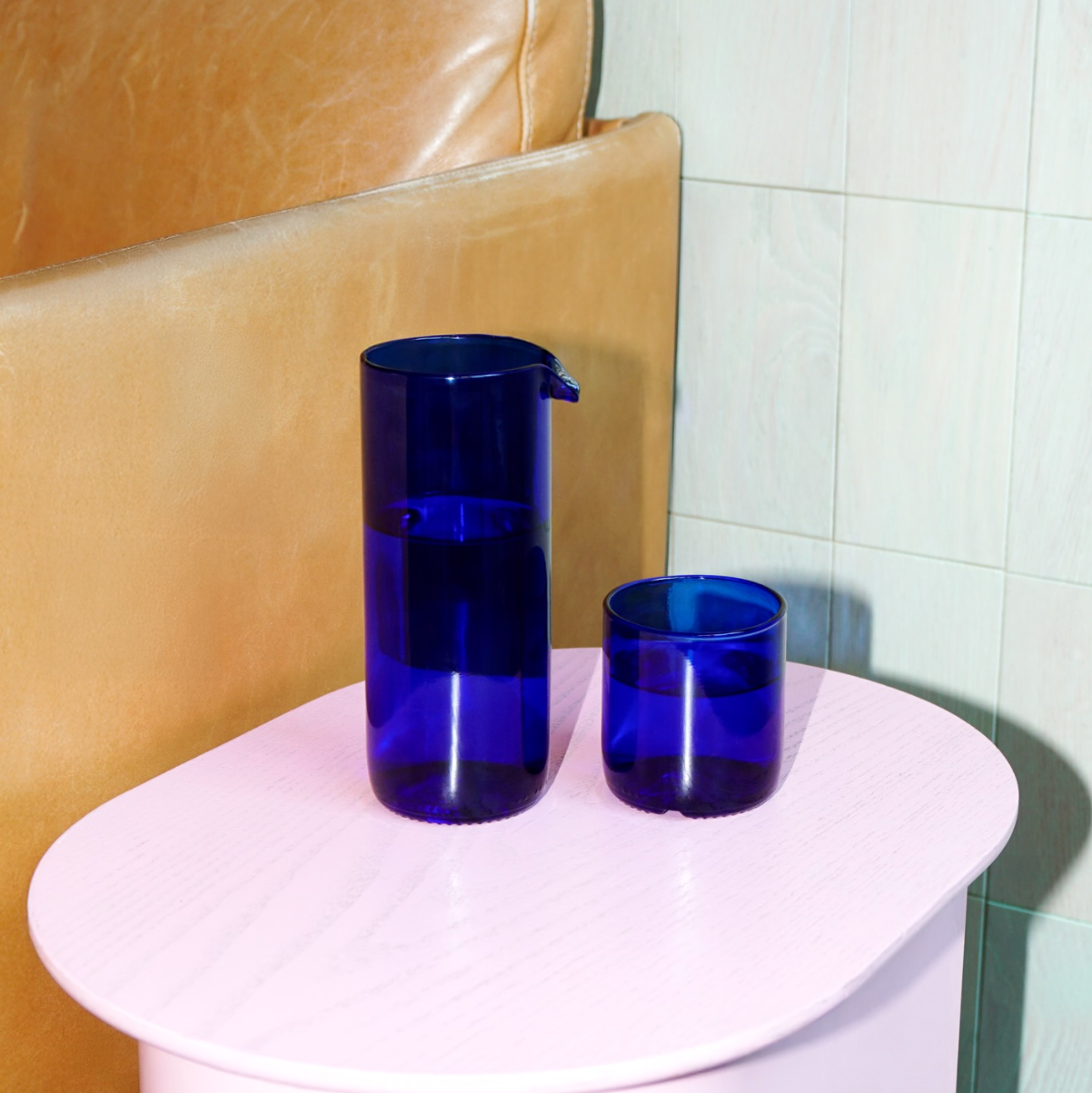 Rebottled Carafe N°1 Edition Blue in transparent glass, showcasing its sleek, modern design and vibrant blue accent.