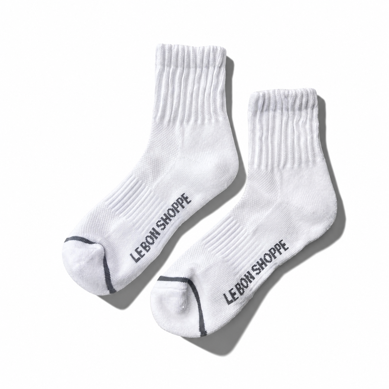 Close-up of Le Bon Shoppe Swing Socks featuring colorful, striped knit fabric and ribbed cuffs for a cozy, stylish look.