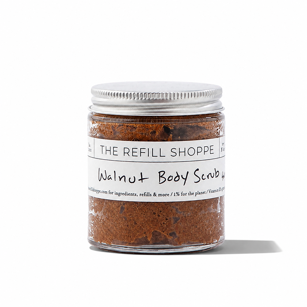 Walnut Body Scrub from The Refill Shoppe featuring natural exfoliating walnut pieces in a jar for bath and body care.