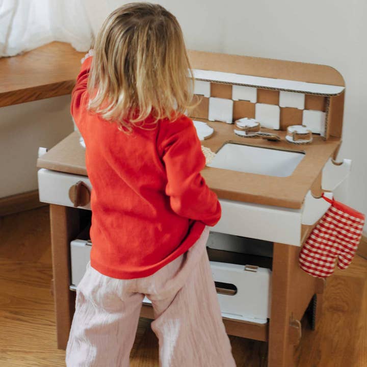 Play Kitchen Tasty by Papperlapapp featuring colorful toy kitchen with stove, oven, and utensils for imaginative play