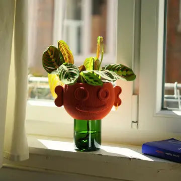 Stylish Stuart Studio Flower Pot with a modern design, featuring a smooth finish and neutral color suitable for indoor or outdoor plants.
