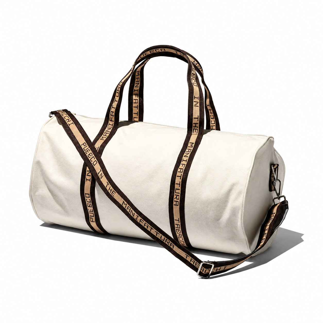 Puebco barrel bag made of durable fabric with leather straps, featuring a rounded shape and adjustable shoulder strap.