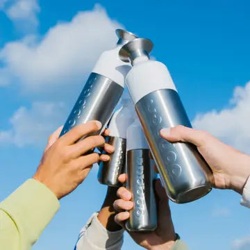 Dopper steel water bottle, reusable waterfles with sleek stainless steel design and screw-on lid, ideal for hydration on the go