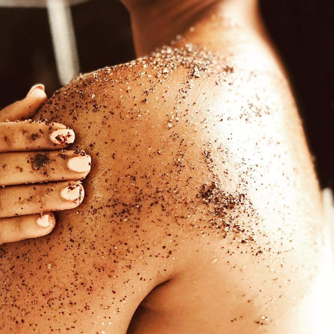 Walnut Body Scrub from The Refill Shoppe, natural bath and body exfoliant in a jar with textured walnut particles.