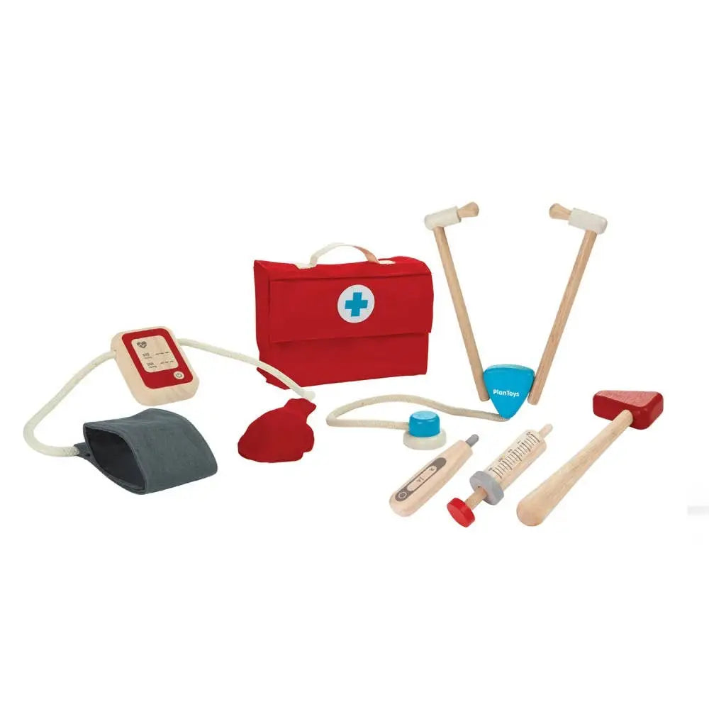 PlanToys doctor play set with toy medical tools, stethoscope, and patient accessories for imaginative role-playing.