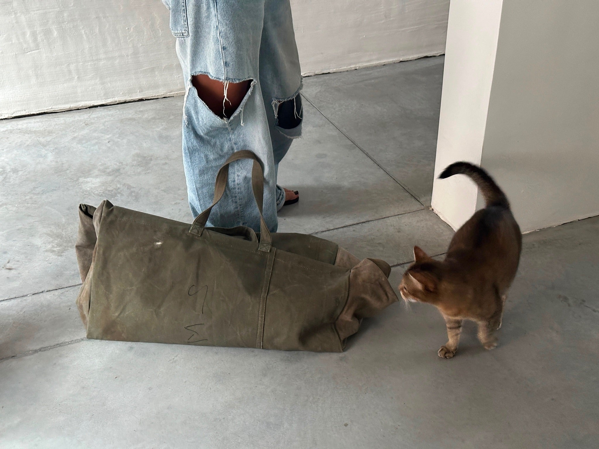 Large vintage tent fabric bag by Puebco with sturdy handles and spacious interior, ideal for storage or carrying items.