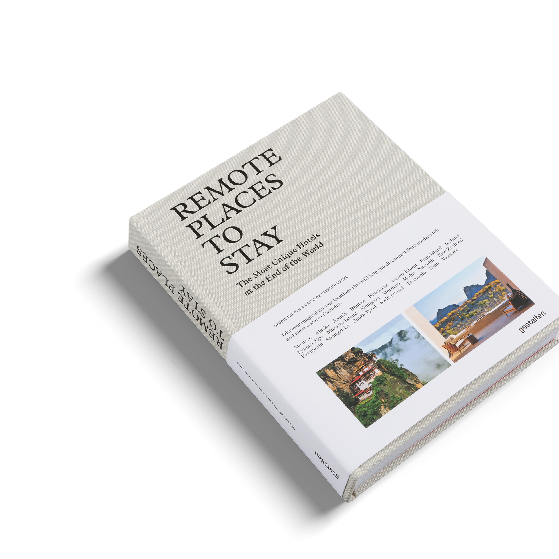 Open book titled "Remote Places To Stay" by Gestalten & teNeues, featuring scenic travel photography and descriptions of secluded accommodations.